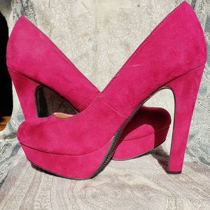 Hot pink suede pumps